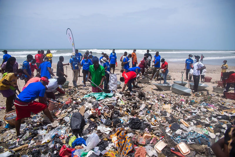Volunteers collecting waste during a Mayekoo beach cleanup in Accra, Ghana