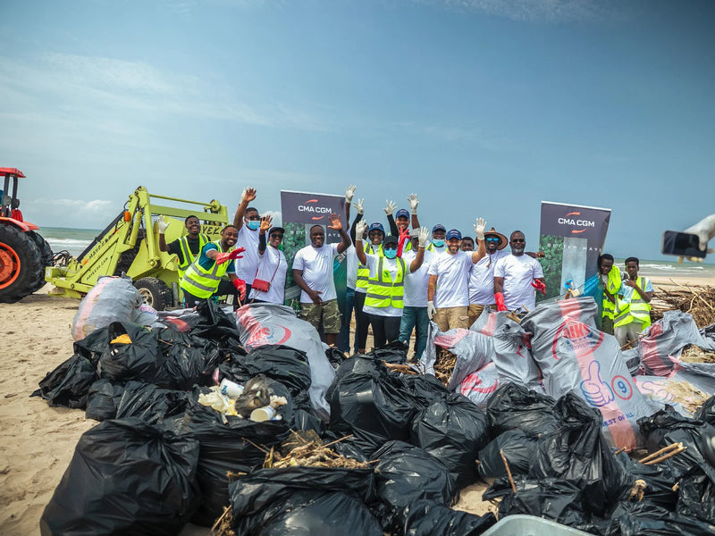 Collected beach waste being prepared for haul-off during a Mayekoo coastal cleanup